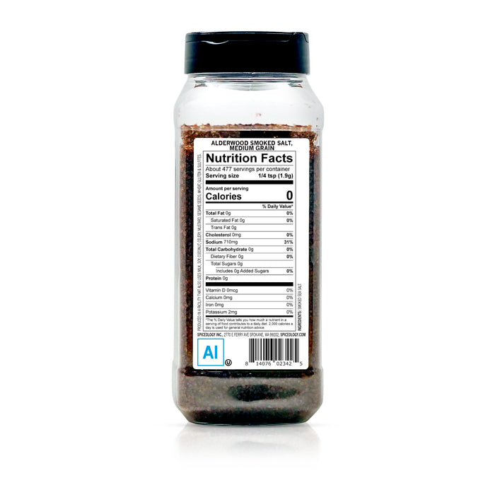 Clear container with black lid and nutrition label on a white background