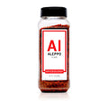 Front of a Spiceology Aleppo Flake spice jar on a white background with red and white periodic-table-style Al label