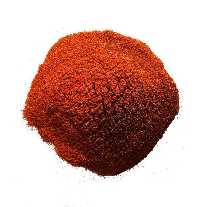 Closeup of reddish-orange powder