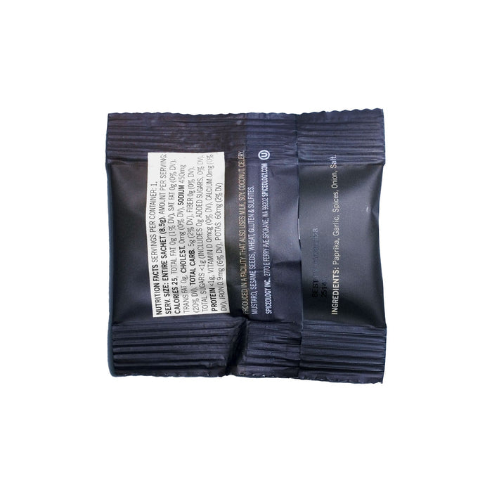 Black back of Black Magic seasoning packet with nutrition facts and ingredients on a white background