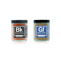 Two spice jars labeled 'Black Magic' and 'Greek Freak' on a white background