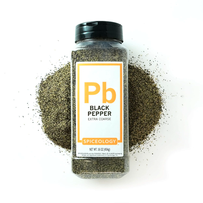 Bottle of Spiceology black pepper extra coarse on a white background