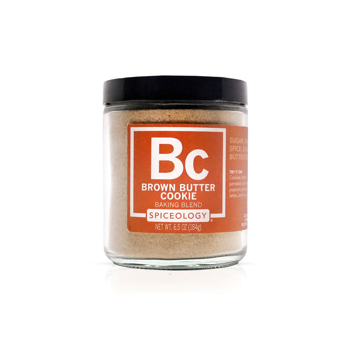 Jar of brown butter cookie baking blend with a red label on a white background