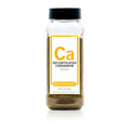 Bottle of Spiceology decorticated cardamom on a white background