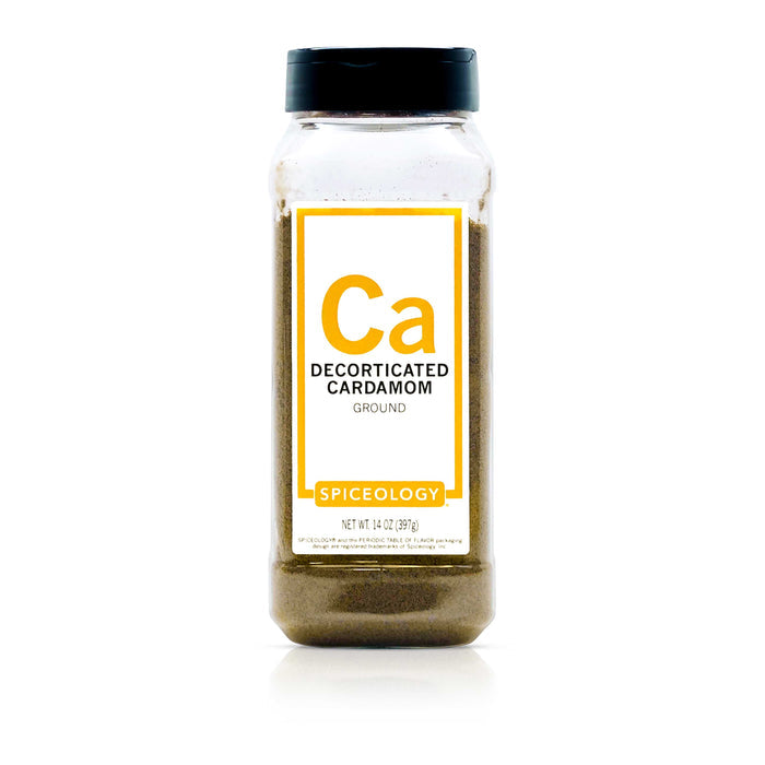 Bottle of Spiceology decorticated cardamom on a white background