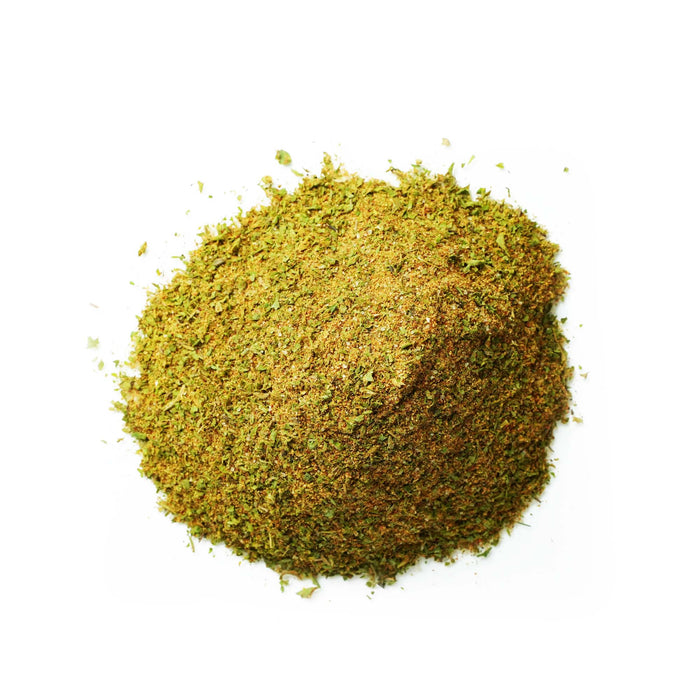 Closeup of yellow powder with light green flakes