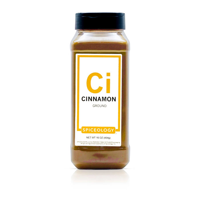 Bottle of Spiceology cinnamon ground on a white background