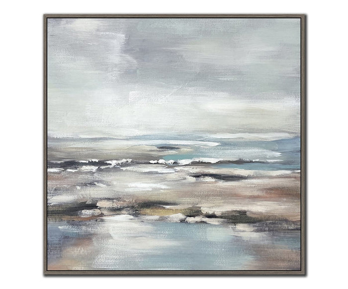 Abstract paintings of tranquil seascapes in soft blue, gray, and beige tones depict gentle waves and a cloudy sky. The hand-embellished Coastal Veil I & II Wall Art Set features blurred brushstrokes that evoke a calm, serene atmosphere. Each piece is framed with a simple border, bringing an elegant touch to any space.