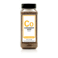 Bottle of Spiceology coriander seeds on a white background