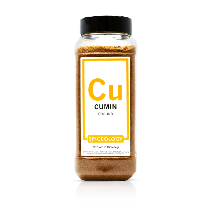 Jar of Spiceology ground cumin on a white background