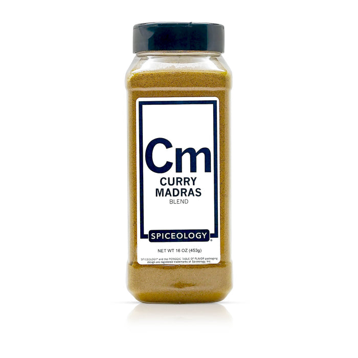 Bottle of Curry Madras blend from Spiceology on a white background