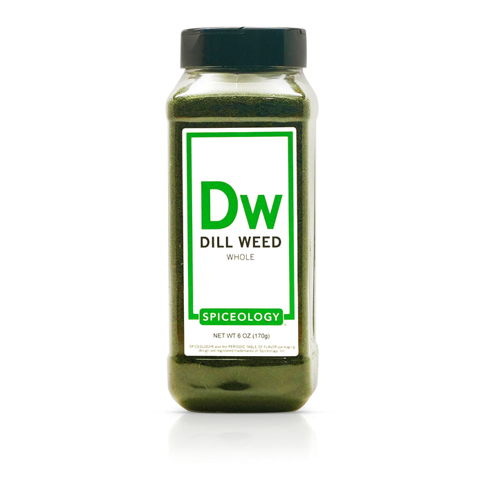 Bottle of Spiceology dill weed whole on a white background
