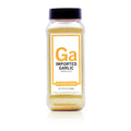 Bottle of Spiceology imported garlic granules on a white background