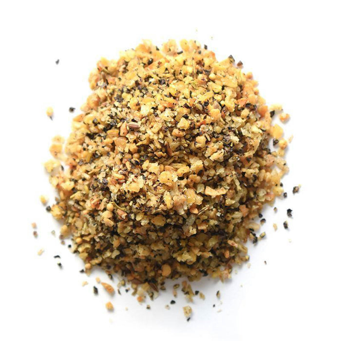 Closeup of yellow, black and tan large granules