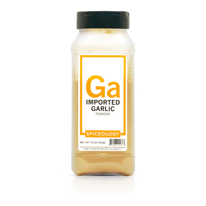 Bottle of Spiceology garlic powder imported on a white background