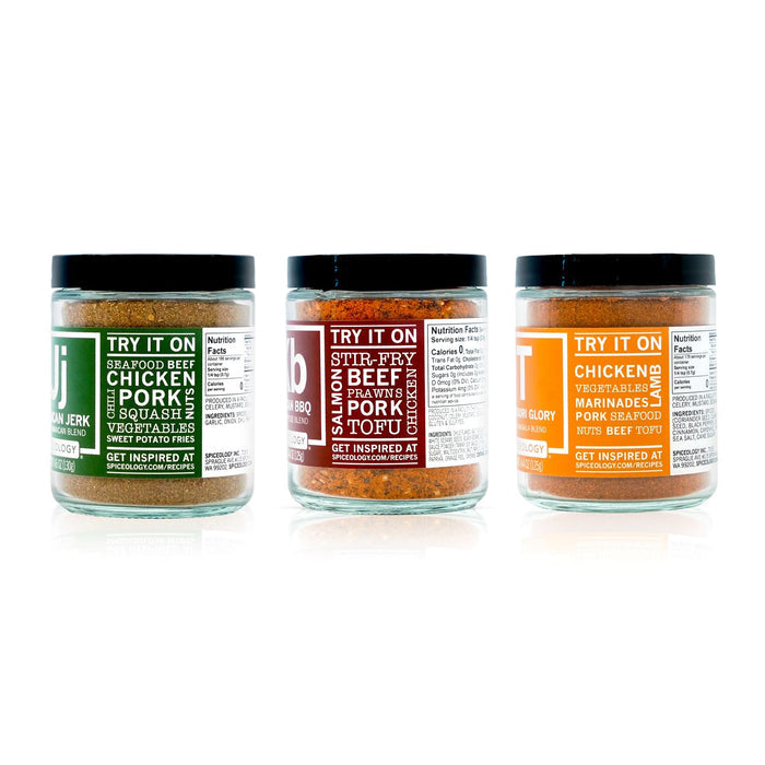 Three jars of Spiceology Global Bundle spice blends on a white background