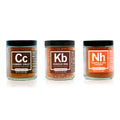 Three jars of Spiceology Grilling Bundle spice blends labeled Cowboy Crust, Korean BBQ and Nashville Hot Chicken on a white background