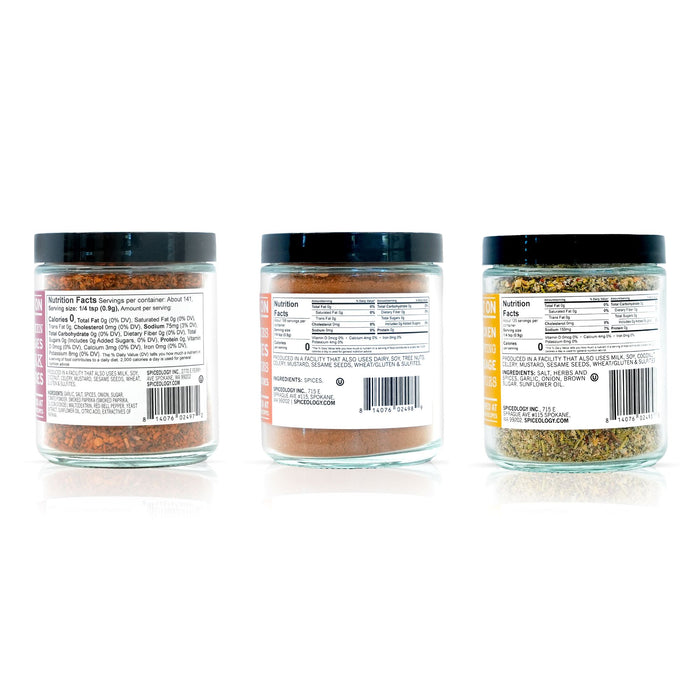 Three jars of Spiceology Holiday Bundle spice blends nutrition facts labels on a white background