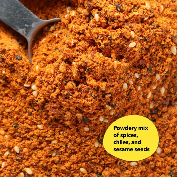 Metal measuring spoon in a pile of korean bbq seasoning