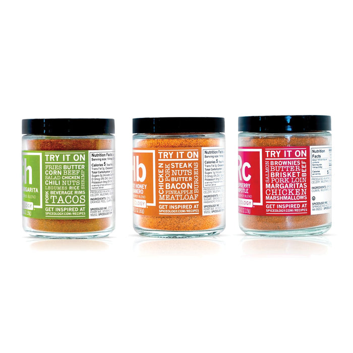 Three jars of seasoning with labels on a white background