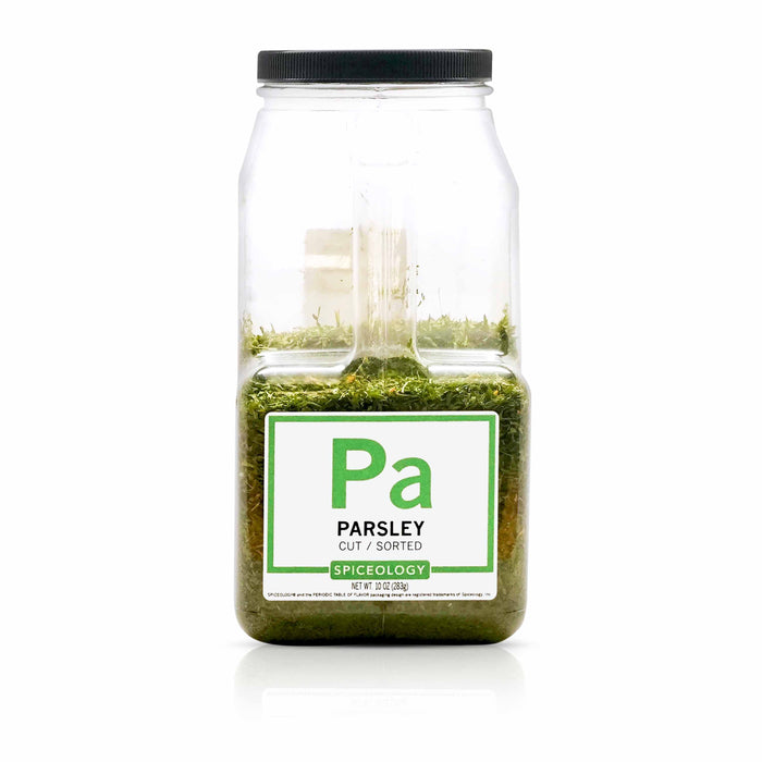 Bottle of Spiceology parsley on a white background