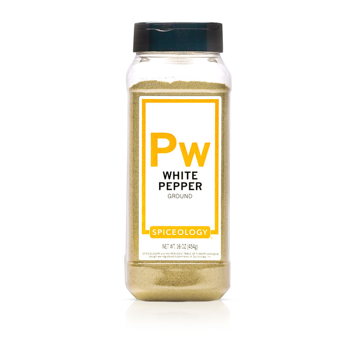 Spiceology white pepper bottle on a white background