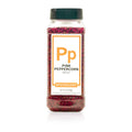 Bottle of Spiceology pink peppercorns on a white background