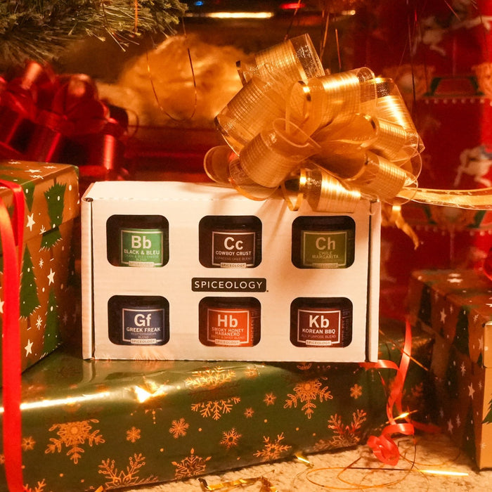 Spiceology Rub Set 6 Pack gift set with decorative bows and ribbons on a festive background