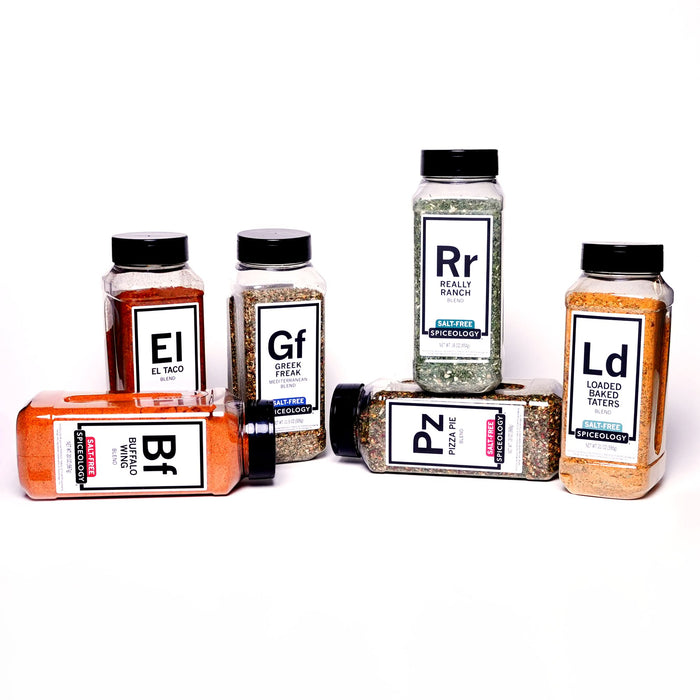 Collection of Spiceology Salt-Free Blend bottles with labels on a white background