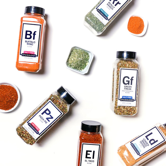 Collection of Spiceology Salt-Free Blend bottles with labels on a white background