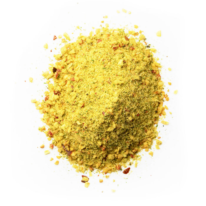 Closeup of yellow flakes with red and green flakes mixed in