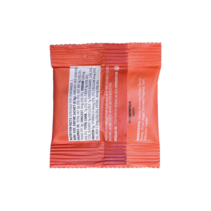 Back of orange packet of Smokey Honey Habanero with white text on a white background