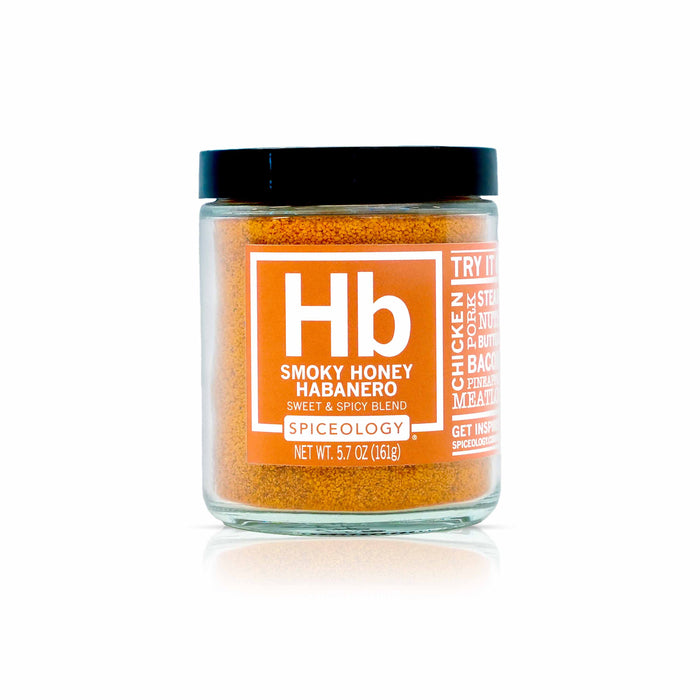 Jar of Spicelogy Smoky Honey Habanero spice blend on a white background