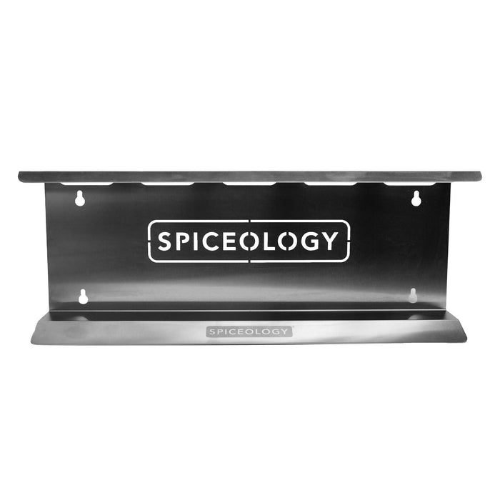 Metal spice rack with 'Spiceology' branding on a white background