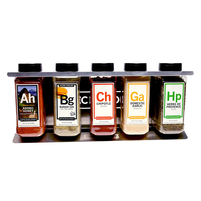 Metal spice rack with 'Spiceology' branding shown holding Adobo Honey, Burger Szn, Chipotle, Domestic Garlic Granules and Herbs De Provence on a white background