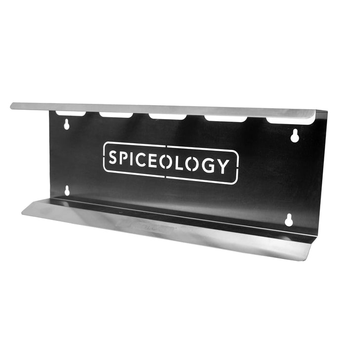 Metal spice rack with 'Spiceology' branding on a white background