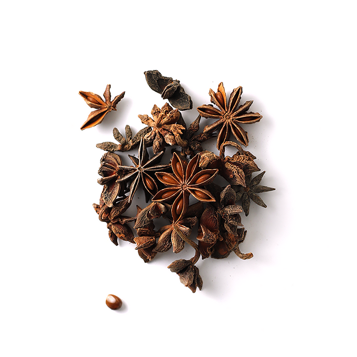 Star anise spices on a white background