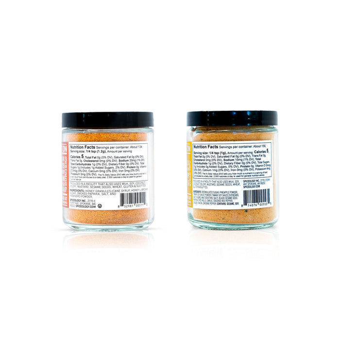 Two jars of a spice blend displaying nutrition facts and ingredient information on a white background