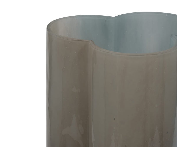 Close-up of the Twilight Vase, featuring wavy edges, a grayish translucent tint, and a smooth glossy surface that highlights the hand-finished artistry of this contemporary glass vase.